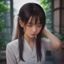 网络安全专家李晓彤头像，女性，专业气质，深色职业装，办公室背景